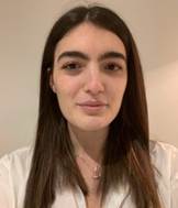 A person taking a selfie

Description automatically generated